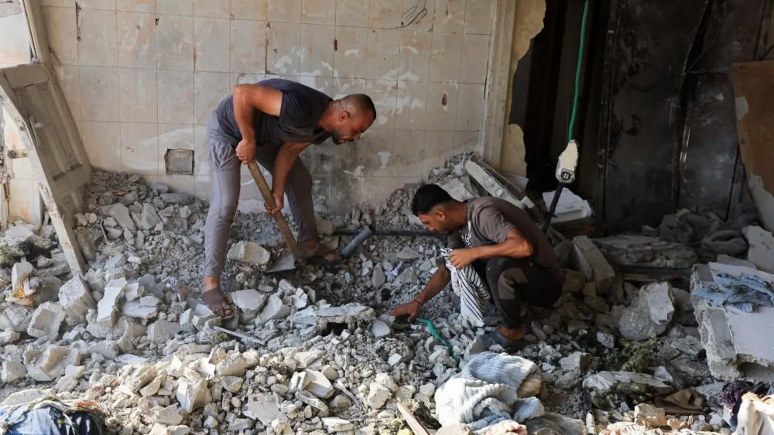 At least 13 killed in Israeli strikes on Gaza after Hamas accepts disarmament deal